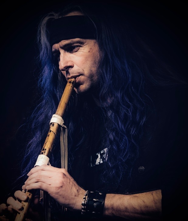 Raven playing flute